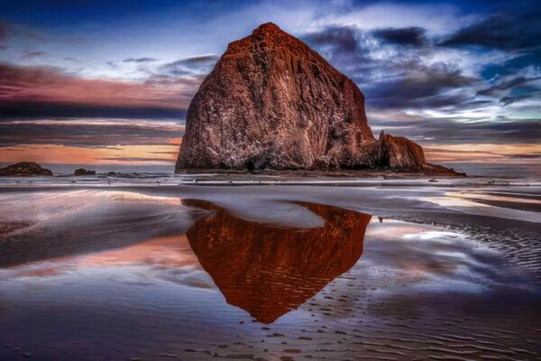 Haystack Rock attracts artists and tourists alike to celebrated Cannon Beach. (Maria Coulson)