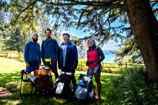 Backpackers Dan Egan, 43, Boston; Nathan Carbajal, 31, Montgomery, Texas; Brave Nguyen, 46, Baytown, Texas; and Heather O’Connell, 42, Kona, Hawaii, at Arch Rock viewpoint and picnic area near the California state line. (Maria Coulson)