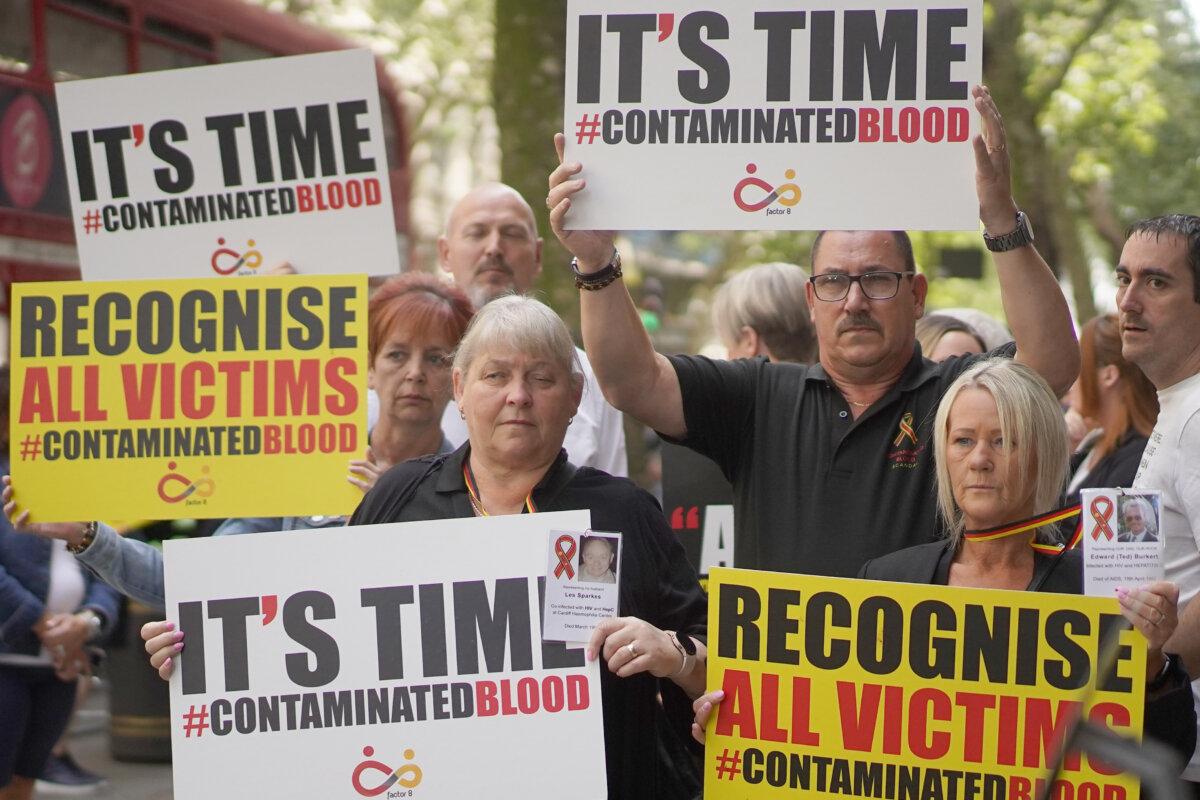 Campaigners - including many who are personally affected - protesting outside the Infected Blood Inquiry in London on July 26, 2023. (Victoria Jones/PA Wire)