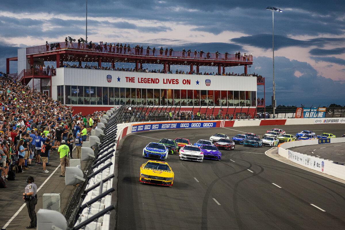 Joey Logano, driver of the #22 Shell Pennzoil Ford, leads the field during the NASCAR Cup Series All-Star Race at North Wilkesboro Speedway in North Wilkesboro, North Carolina on May 19, 2024. (James Gilbert/Getty Images)