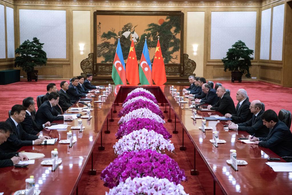 Azerbaijan President Ilham Aliyevspeaks (R) speak to CCP Leader Xi Jinping (L) during a meeting at the Great Hall of the People in Beijing, China on April 24, 2019. (Fred Dufour/AFP via Getty Images)