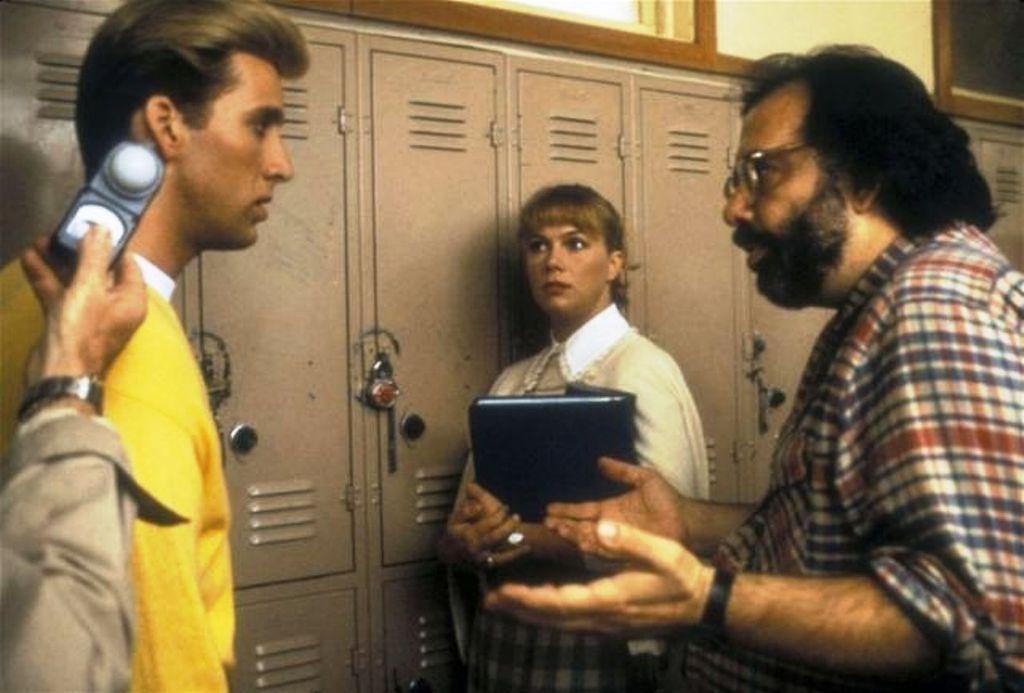 (L–R) Nicolas Cage, Kathleen Turner, and director Francis Ford Coppola on the set of “Peggy Sue Got Married.” (Tri-Star Pictures )