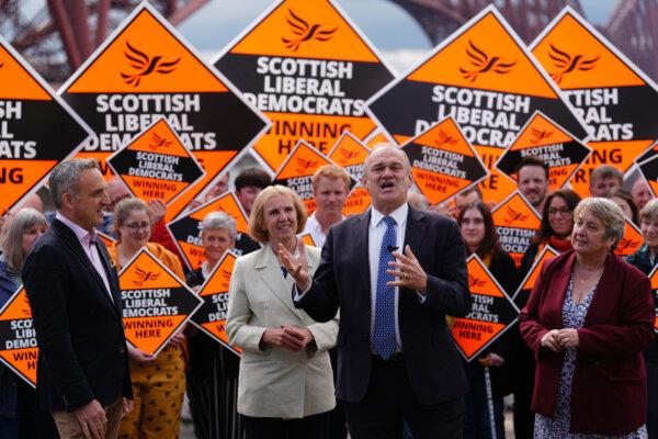 Liberal Democrat Leader Sir Ed Davey (C) speaks at an event, accompanied by Scottish Lib Dem leader Alex Cole-Hamilton (L) and parliamentary candidates Susan Murray (C) and Christine Jardine (R), at North Queensferry, Scotland on May 27, 2024. (Andrew Milligan/PA Wire)