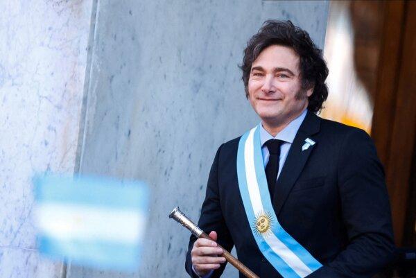 Argentinian President Javier Milei takes the stage outside the Cabildo during the commemoration of the 214th anniversary of the May Revolution, in Cordoba, Argentina, on May 25, 2024. (Leandro Bustamante Gomez/Reuters)