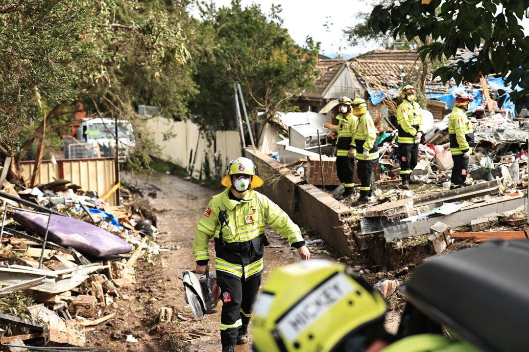Race to Find Person Trapped After Townhouse Collapse