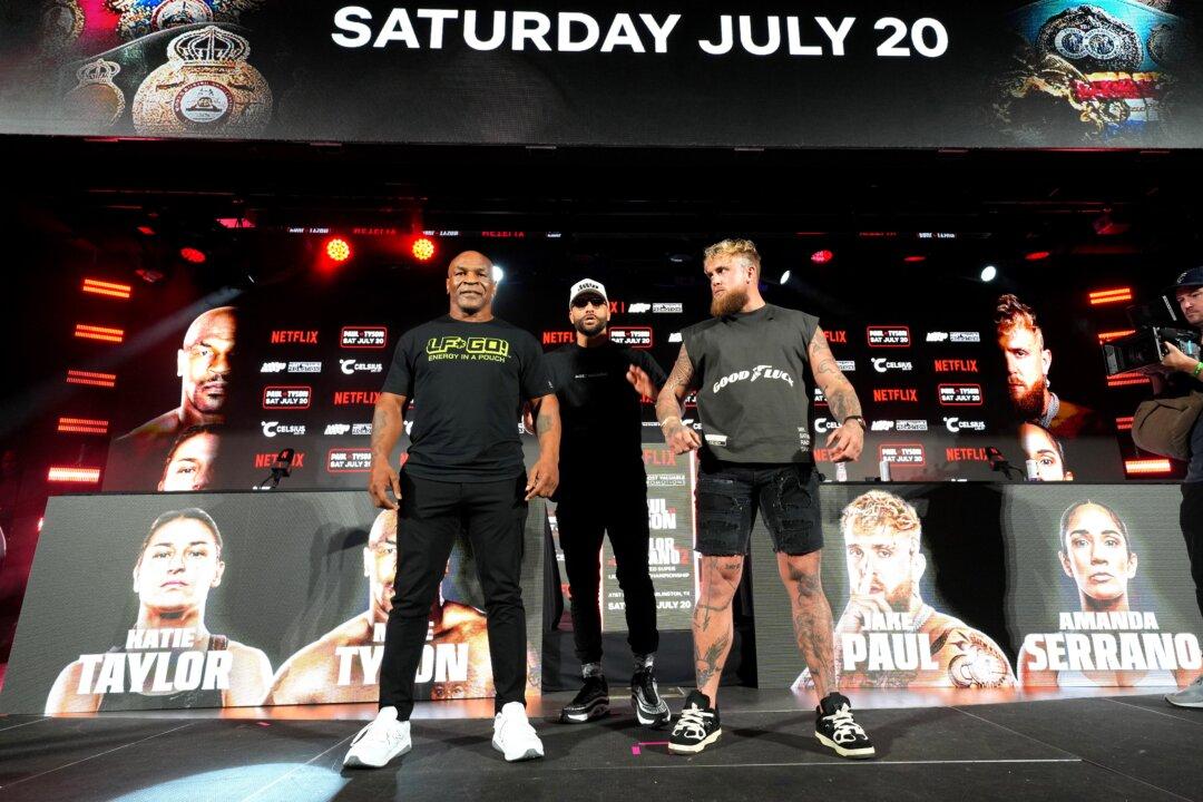 Mike Tyson vs. Jake Paul Match Postponed Following Tyson’s Health Scare