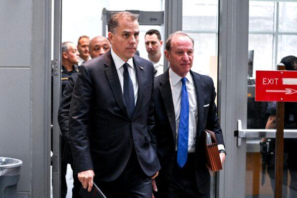 Hunter Biden (L), son of President Joe Biden, and attorney Abbe Lowell arrive for a closed-door deposition with the House Oversight and Judiciary committees on Capitol Hill in Washington on Feb. 28, 2024. (Roberto Schmidt/AFP via Getty Images)