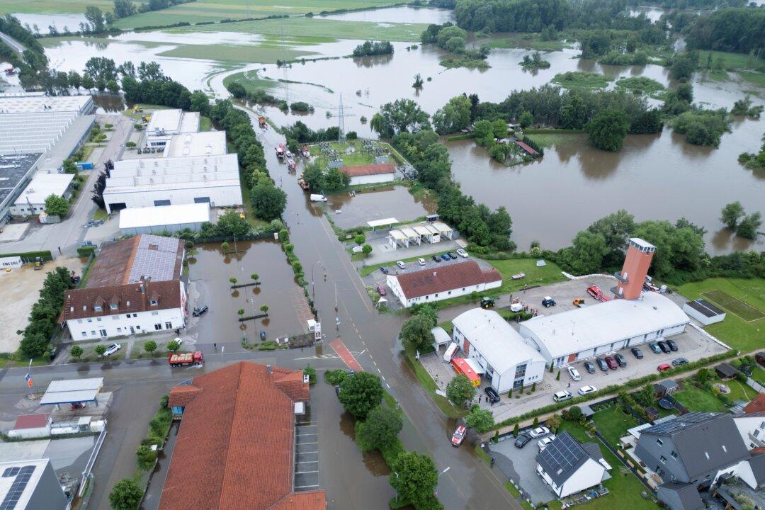 Firefighter Dies and Long-Distance Train Derails Amid Heavy Rains and Flooding in Germany