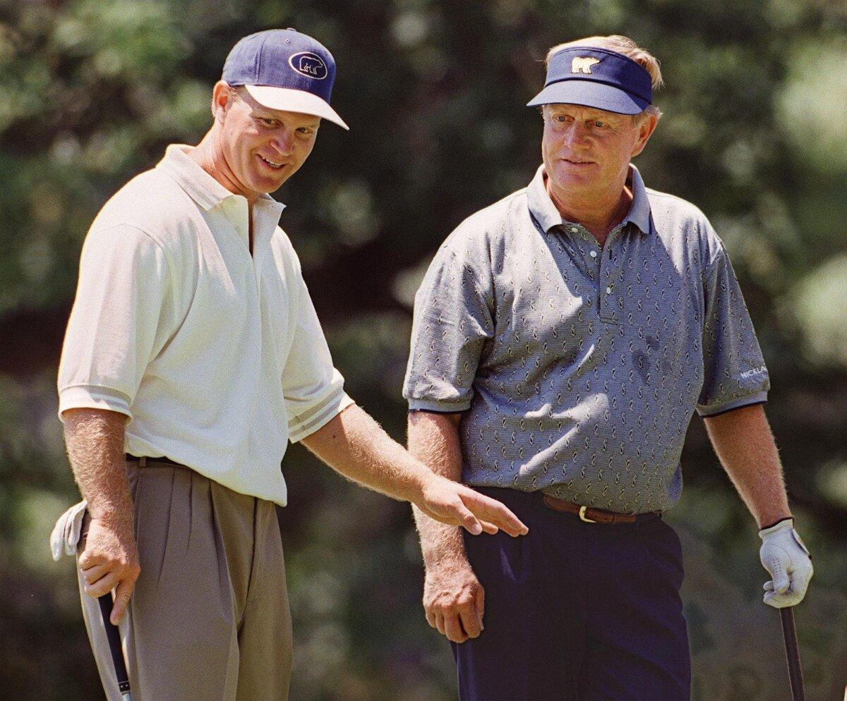 Jack Nicklaus (R) and his son Gary Nicklaus talk after finishing up on the 9th green during a practice round before the 1997 US Open Golf tournament at the Congressional Country Club in Bethesda, Md., on June 9, 1997. (Stephen Jafe/AFP via Getty Images)