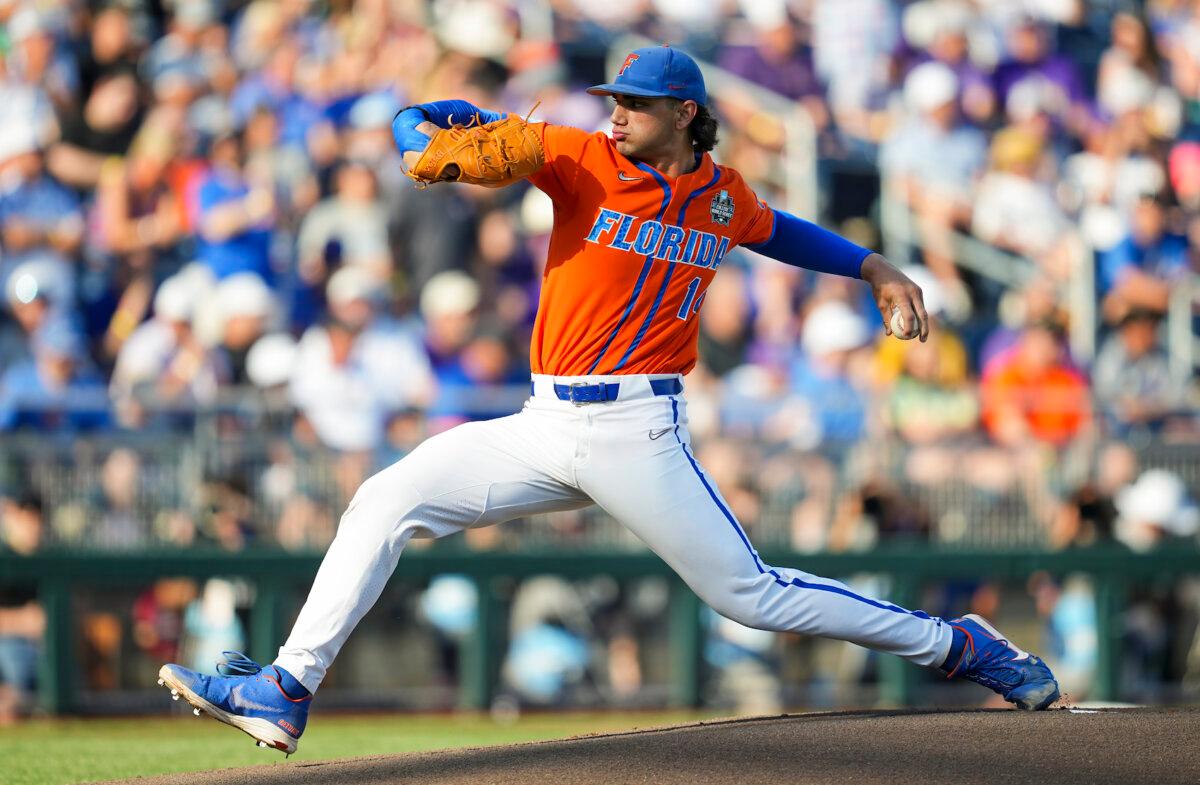 Jac Caglianone, #14 of the Florida Gators, pitches against the LSU Tigers during Game 3 of the NCAA College World Series baseball finals at Charles Schwab Field in Omaha, Neb., on June 26, 2023. (Photo by Jay Biggerstaff/Getty Images)