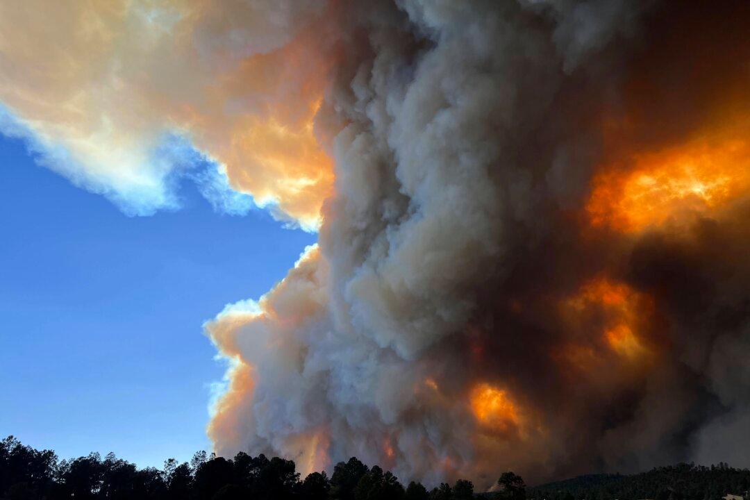 Rains, Cooler Weather Help Firefighters Gain Ground on Large Wildfires in Southern New Mexico