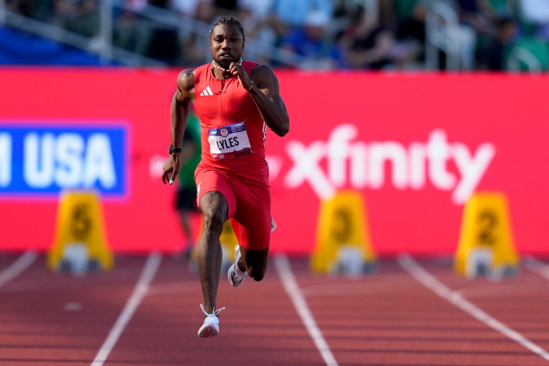 Lyles Matches Personal Best in 100 Meters to Qualify for Paris Olympics