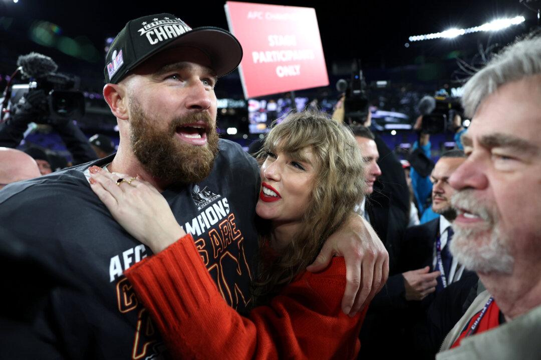 Travis Kelce Joins Taylor Swift on Stage
