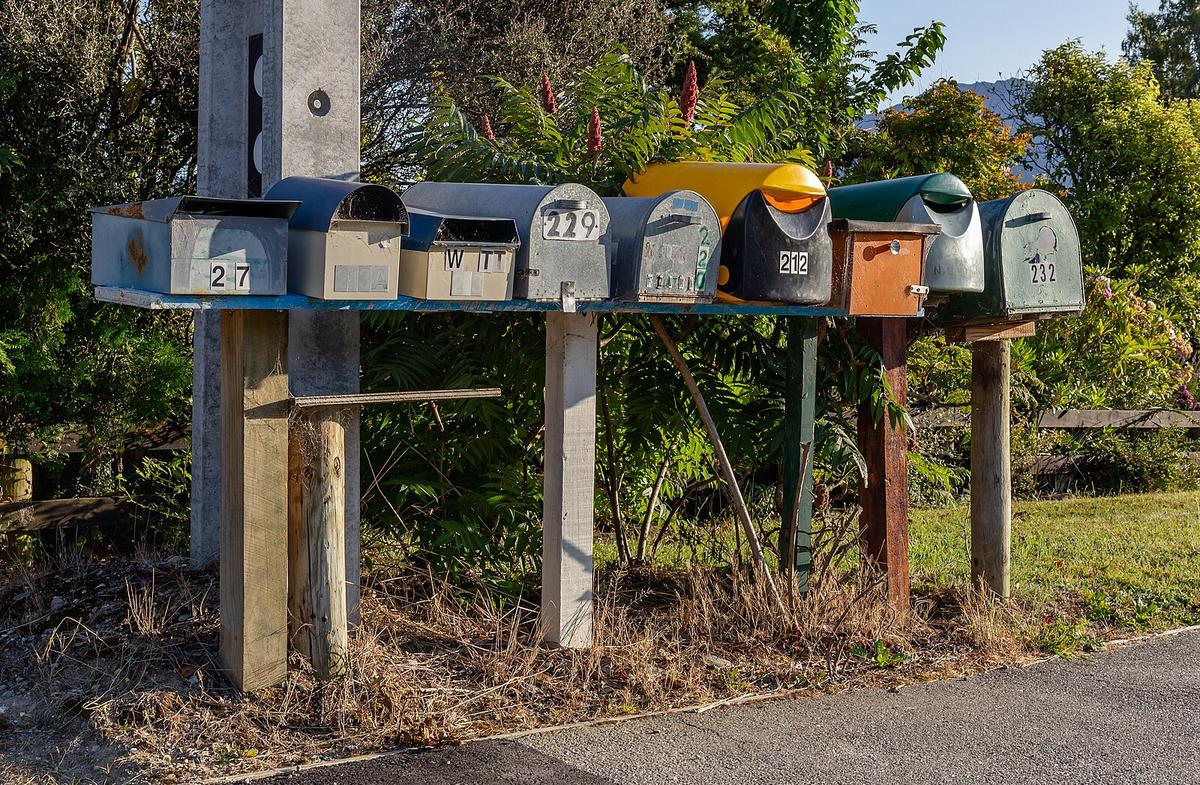 Mailboxes along a rural road in Lake Hawea, New Zealand, speak to the small nation's tight-knit communities and shared rugby-focused values. (<a href="https://commons.wikimedia.org/wiki/User:Podzemnik">Podzemnik</a>/<a href="https://creativecommons.org/licenses/by-sa/4.0/deed.en">CC BY-SA 4.0</a>)