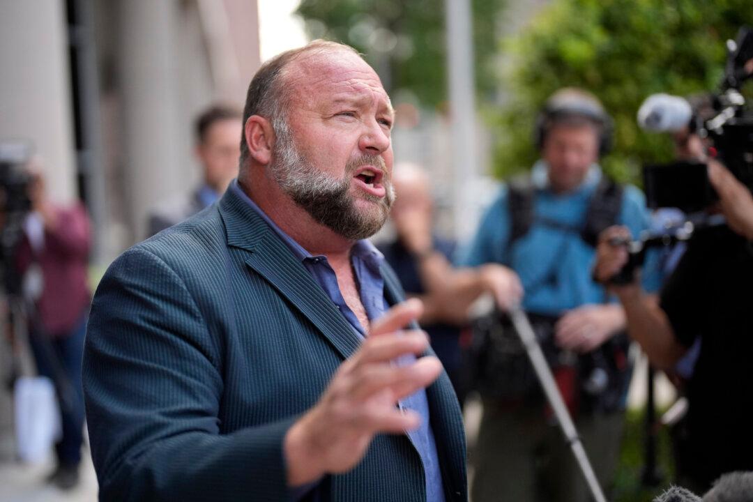 The Onion Buys Alex Jones’s Infowars at Bankruptcy Auction