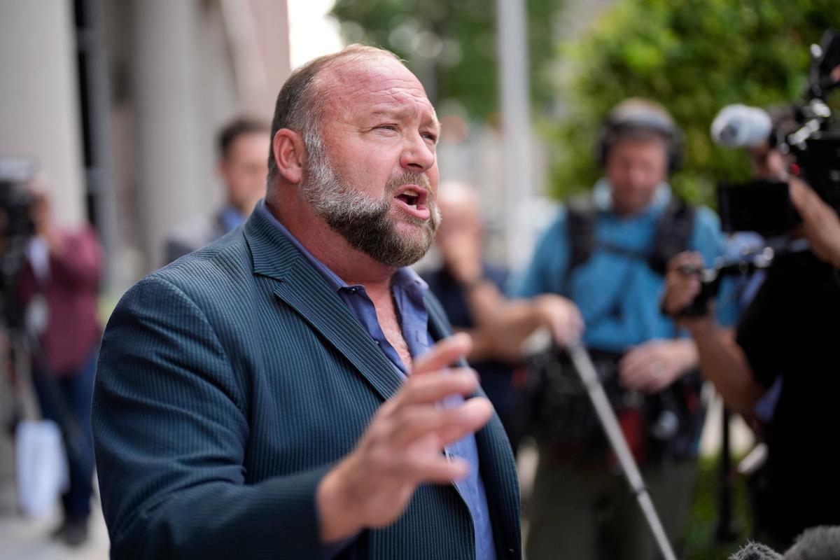 The Onion Buys Alex Jones’s Infowars at Bankruptcy Auction
