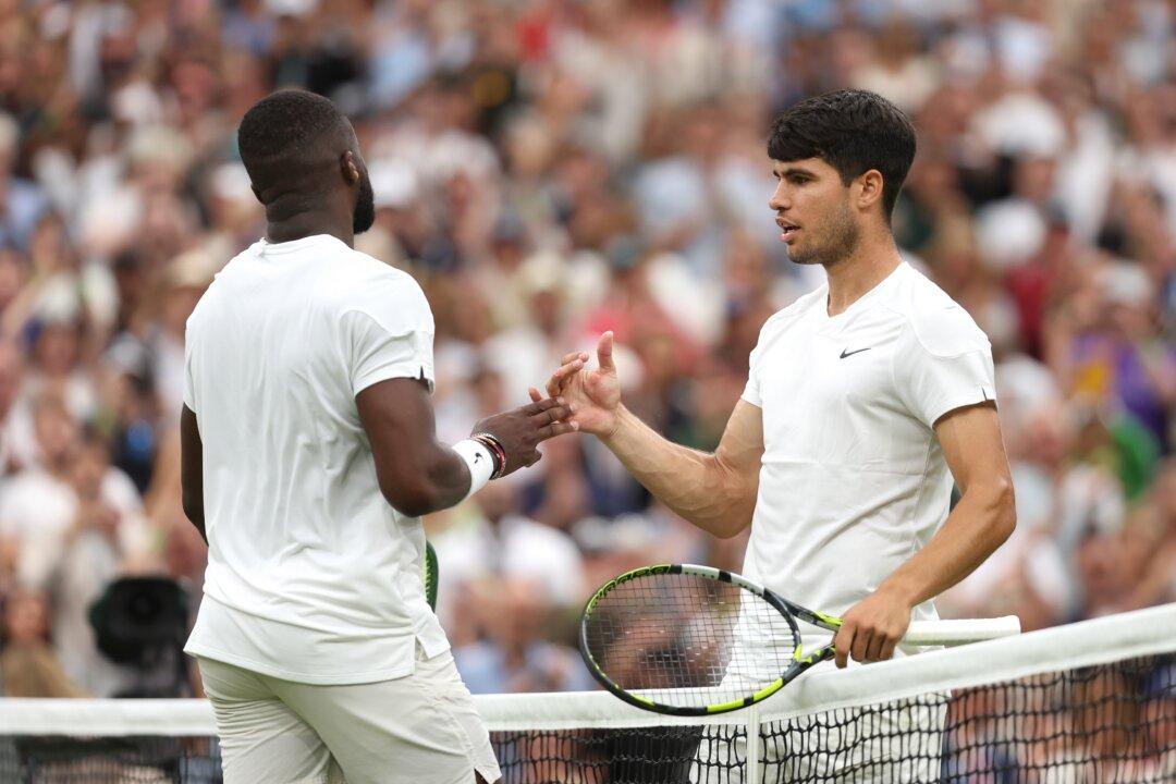 Defending Champion Carlos Alcaraz Comes Back to Beat Frances Tiafoe at Wimbledon in the Third Round