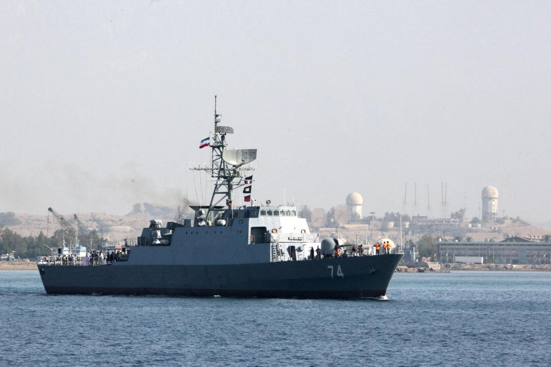 Iranian Warship Capsizes While Undergoing Works in Port