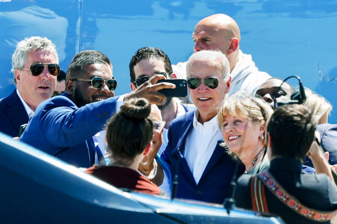 Biden Tells Congressional Democrats He’s Firmly Committed to Staying in Race