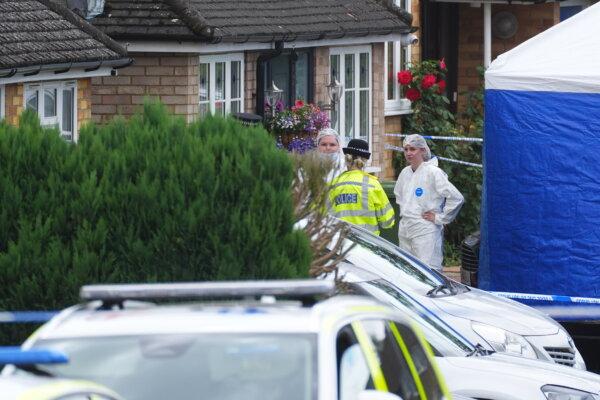 Police and forensic officers at the murder scene in Ashlyn Close, Bushey, Hertfordshire, on July 10, 2024. (James Manning/PA Wire)