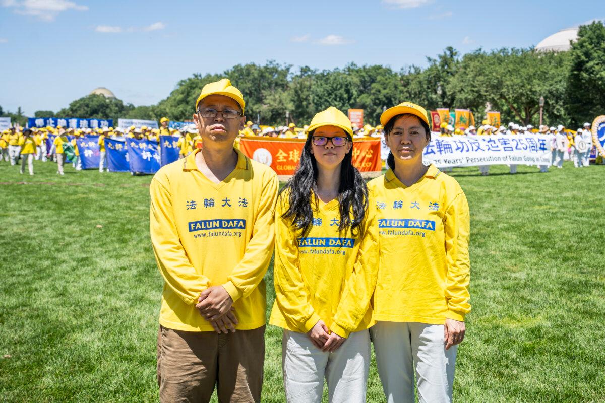 Chen Jingyu (R), a Falun Gong practitioner, with her husband and daughter at a rally at the National Mall in Washington on July 11, 2024. (Madalina Vasiliu/The Epoch Times)