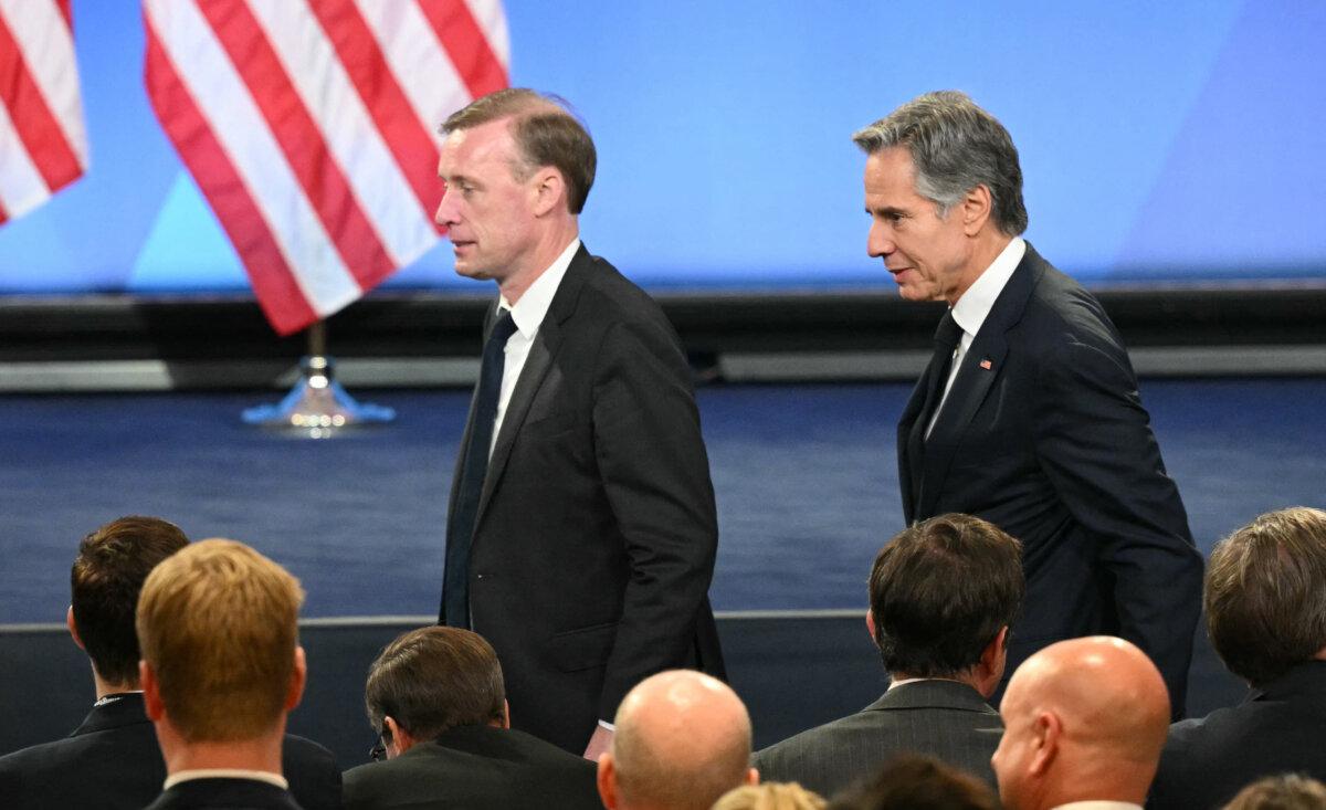 Secretary of State Antony Blinken (R) and US National Security Advisor Jake Sullivan arrive to listen to President Joe Biden's press conference at the close of the 75th NATO Summit at the Walter E. Washington Convention Center in Washington, DC on July 11, 2024. (MANDEL NGAN/AFP via Getty Images)
