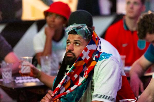 An England fan, wearing Specsavers cheer goggles, watches England's defeat to Spain in the UEFA Euro 2024 final, at Boxpark in Wembley, London, on July 14, 2024. (David Parry/PA Media Assignments)