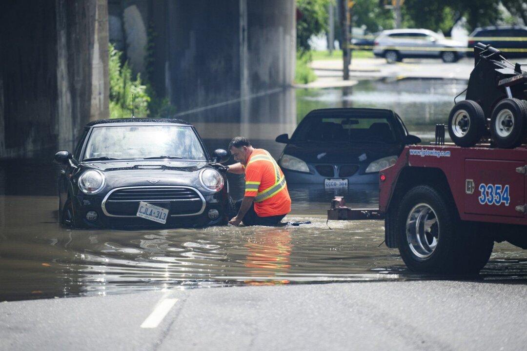 Roads Reopened After Toronto Flash-Flooding Caused by Record Rainfall, Thousands Without Power