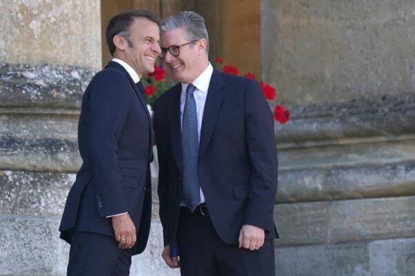 Prime Minister Sir Keir Starmer greets President of France, Emmanuel Macron as he arrives to attend the European Political Community summit at Blenheim Palace in Woodstock, Oxfordshire on July 18, 2024 (Jacob King/PA Wire)