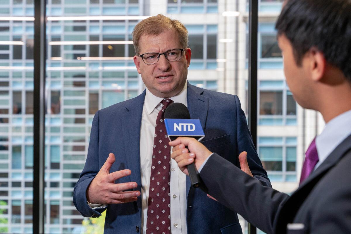 Levi Browde, executive director at the Falun Dafa Information Center, is interviewed after an event at the Hudson Institute in Washington, on July 17, 2024. (Caroline Li/The Epoch Times)