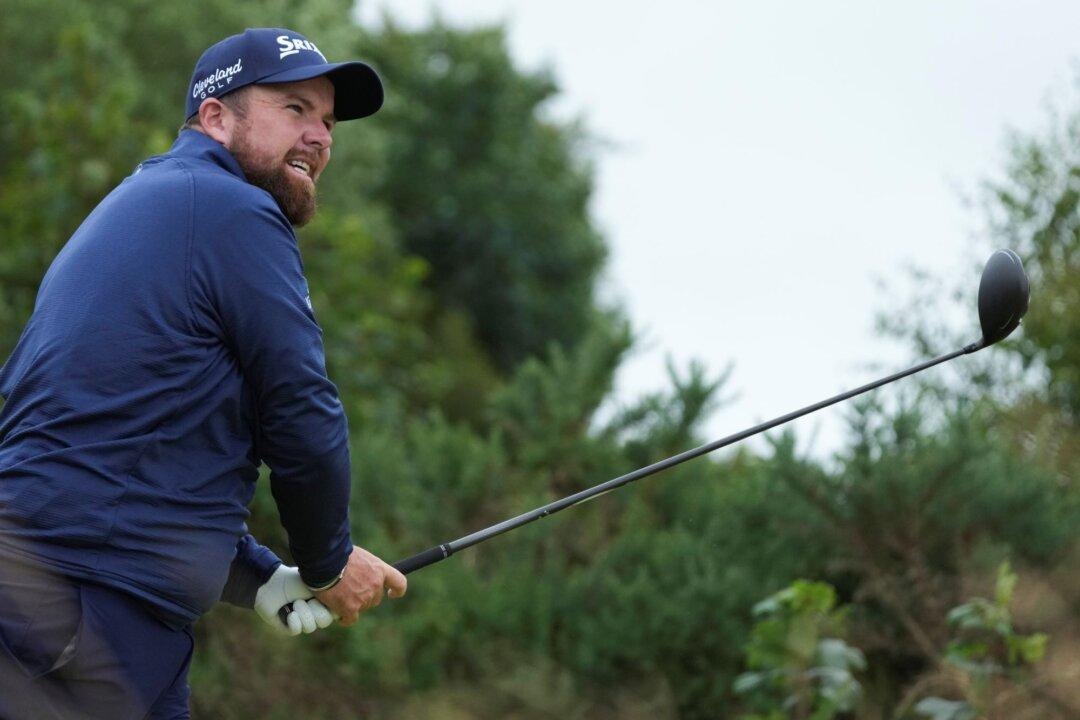 First-Timer Brown Survives Challenging Wind, Takes One-Shot Lead Over Lowry at British Open