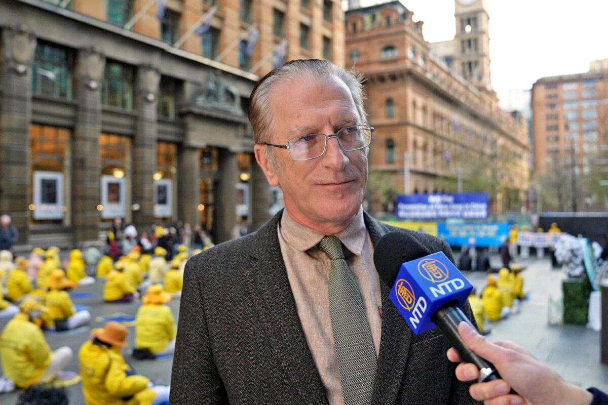 Paul Folley at the commemoration of the 25th year of persecution of Falun Dafa in Martin. Place, Sydney, Australia, on July 18, 2024. (Tom Han/NTD)