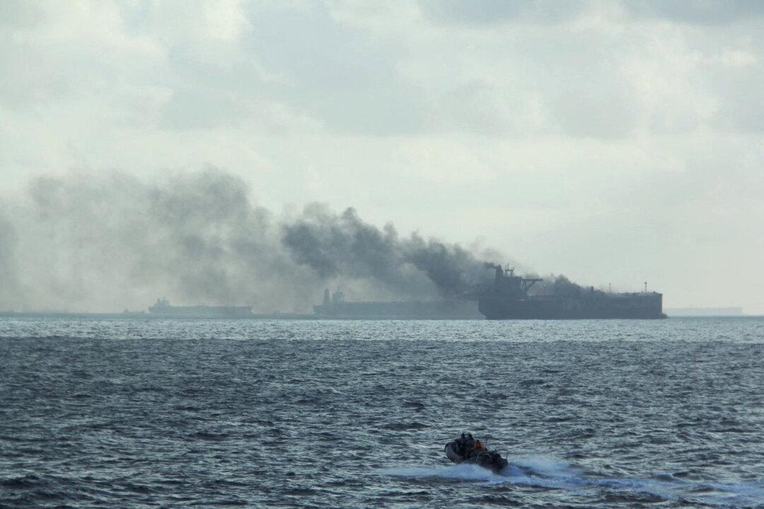 Oil Tanker That Fled Collision Site Is Detained in Malaysia