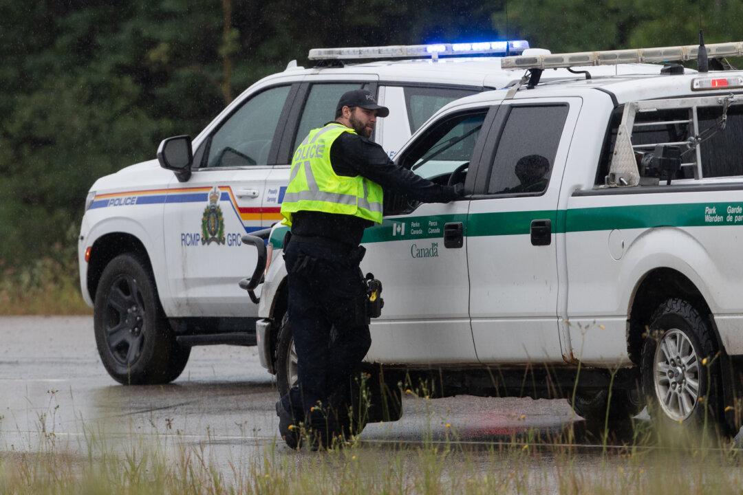 Rain, Cooler Weather Curbing Wildfire Spread in Jasper