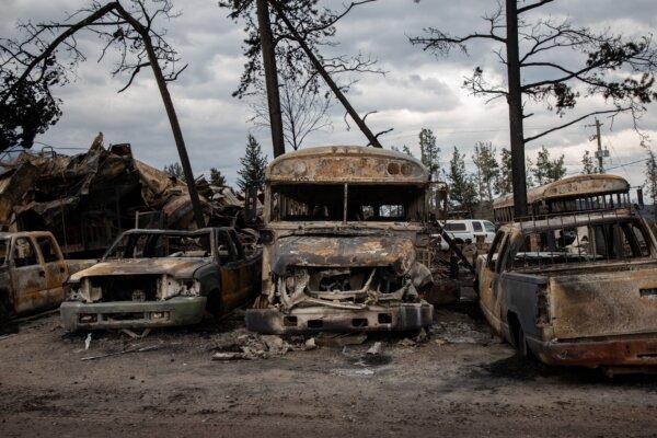 Burnt buses and cars in Jasper on July 26, 2024. (The Canadian Press/Amber Bracken)