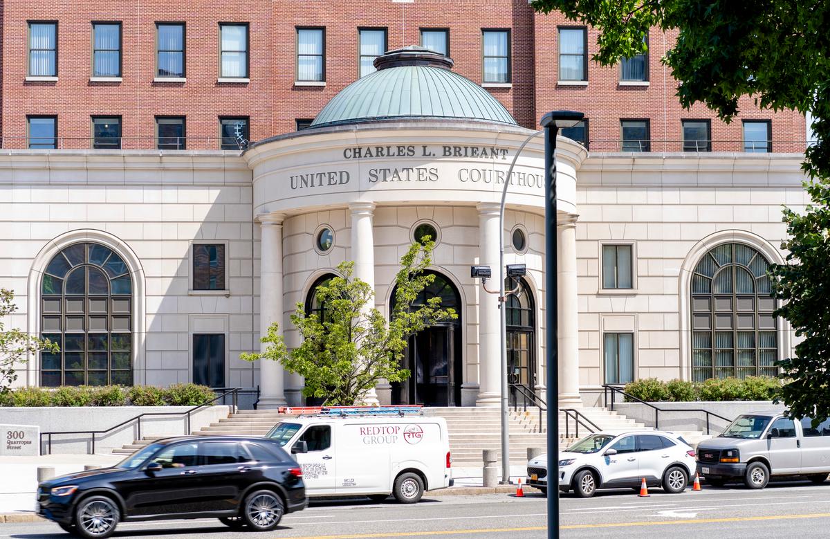 2 Men Plead Guilty to Acting as Illegal Chinese Agents in Plot Against Falun Gong