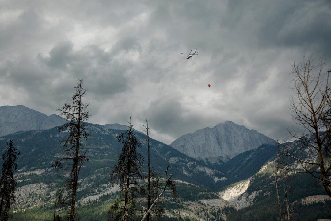 Crews Install Sprinklers on Remaining Jasper Buildings Ahead of Hot Weather