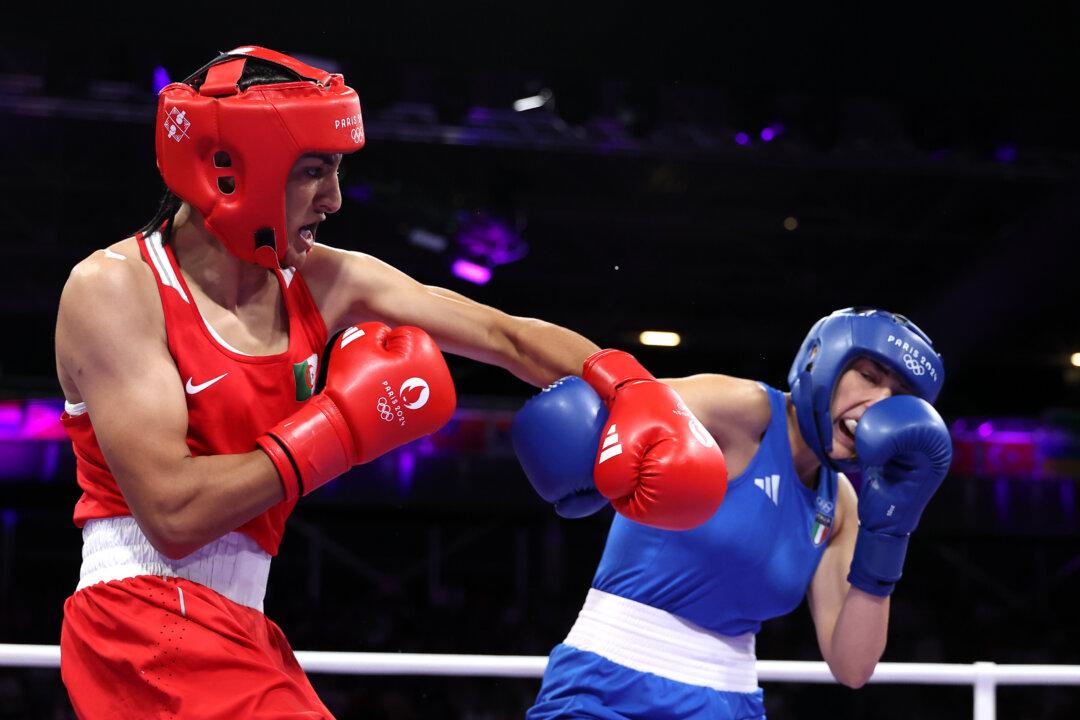 Algerian Boxer Who Previously Failed Gender Eligibility Criteria Wins Olympic Match After Opponent Quits