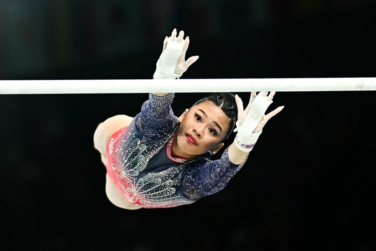 Suni Lee of Team United States competes in the uneven bars event of the artistic gymnastics women's all-around final during the Paris 2024 Olympic Games at the Bercy Arena in Paris, on August 1, 2024. (Loic Venance/ AFP via Getty Images)