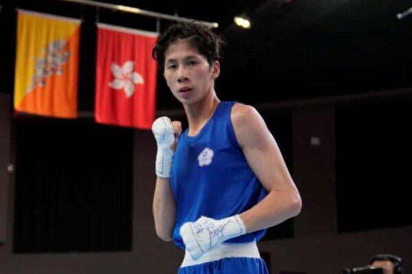 Taiwan's Lin Yu-ting poses after winning against India's Parveen in the Boxing Women's 54-57 kg Semifinal bout during the 19th Asian Games in Hangzhou, China, on Oct. 4, 2023. (Aijaz Rahi/AP Photo)