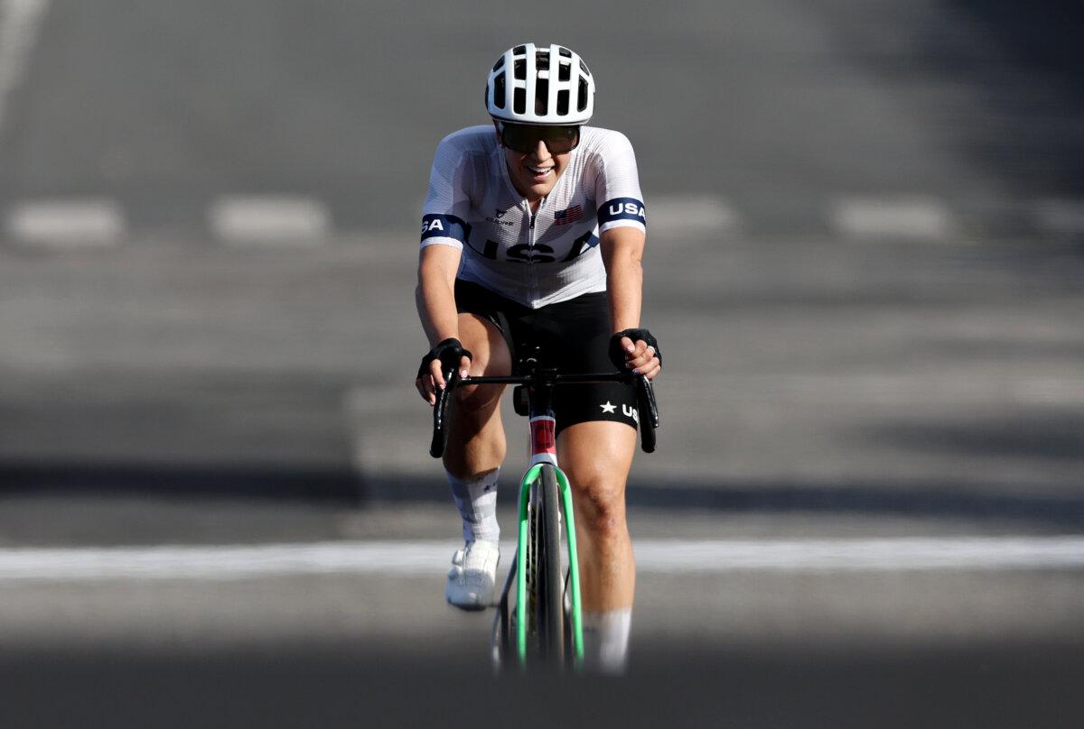 Kristen Faulkner of Team United States celebrates at finish line as Gold medal winner during the Women's Road Race on day nine of the Olympic Games Paris 2024 at Trocadero in Paris on August 4, 2024. (Tim de Waele/Getty Images)