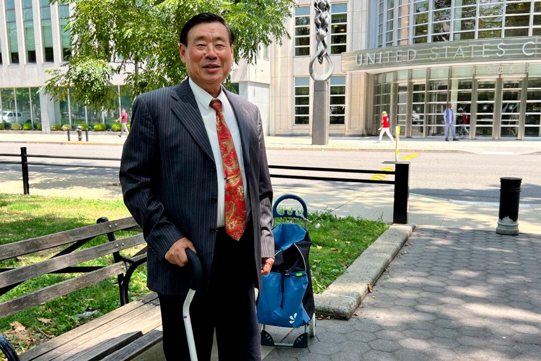 Chinese American Posing as Pro-Democracy Activist Is Convicted of Spying for China