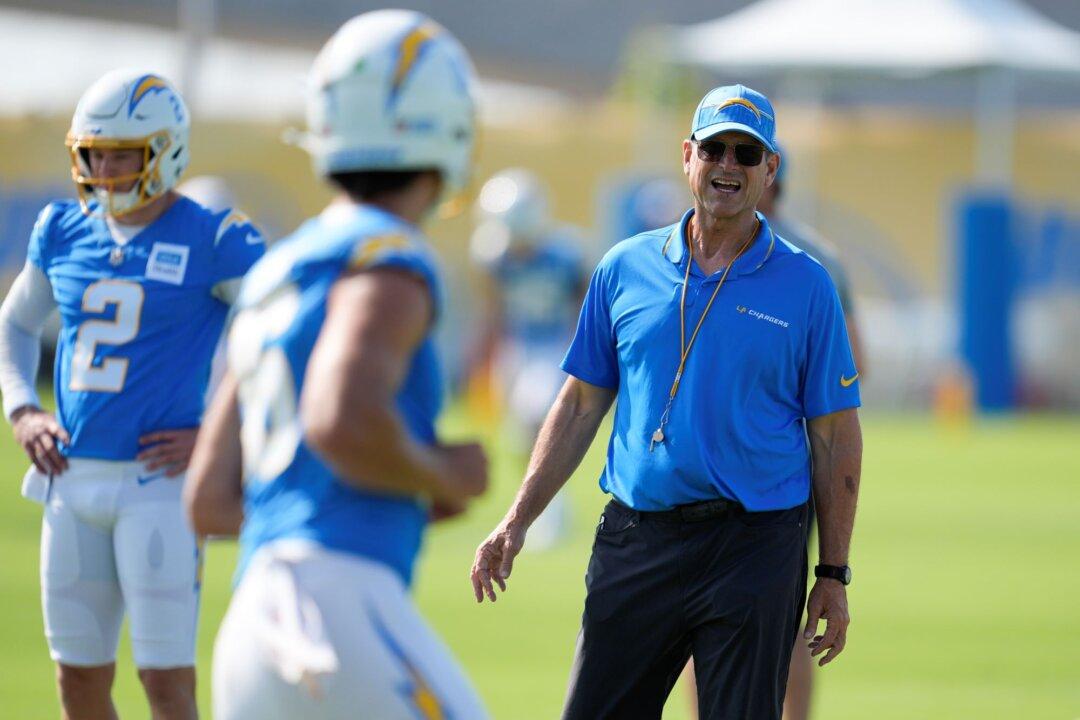 NCAA Cites Chargers Coach Harbaugh for Recruiting Violations While at Michigan