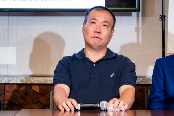 Cheng Peiming, a Falun Gong practitioner who had part of his liver and lung forcibly removed in China, at a press conference in Washington on Aug. 9, 2024. (Madalina Vasiliu/The Epoch Times)
