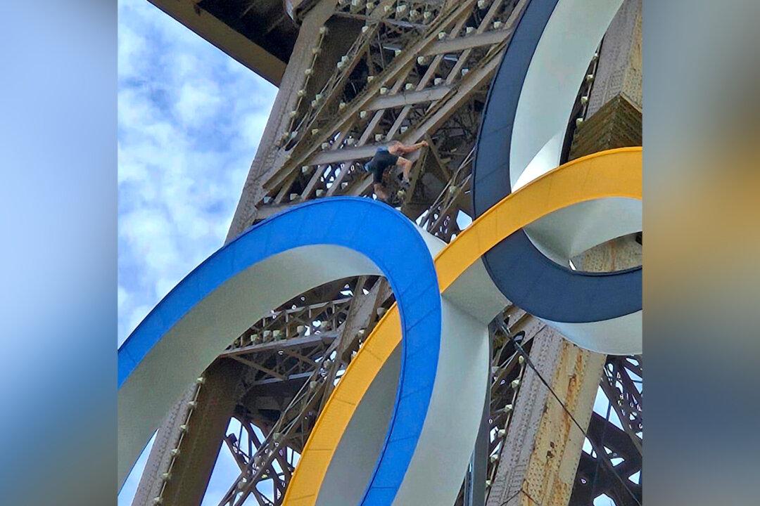 Police Arrest Man Climbing Eiffel Tower, Prompting Evacuation Hours Before Closing Ceremony