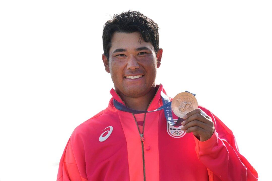 Matsuyama’s Caddie, Coach Return Home to Japan After Passports Stolen Following Olympics