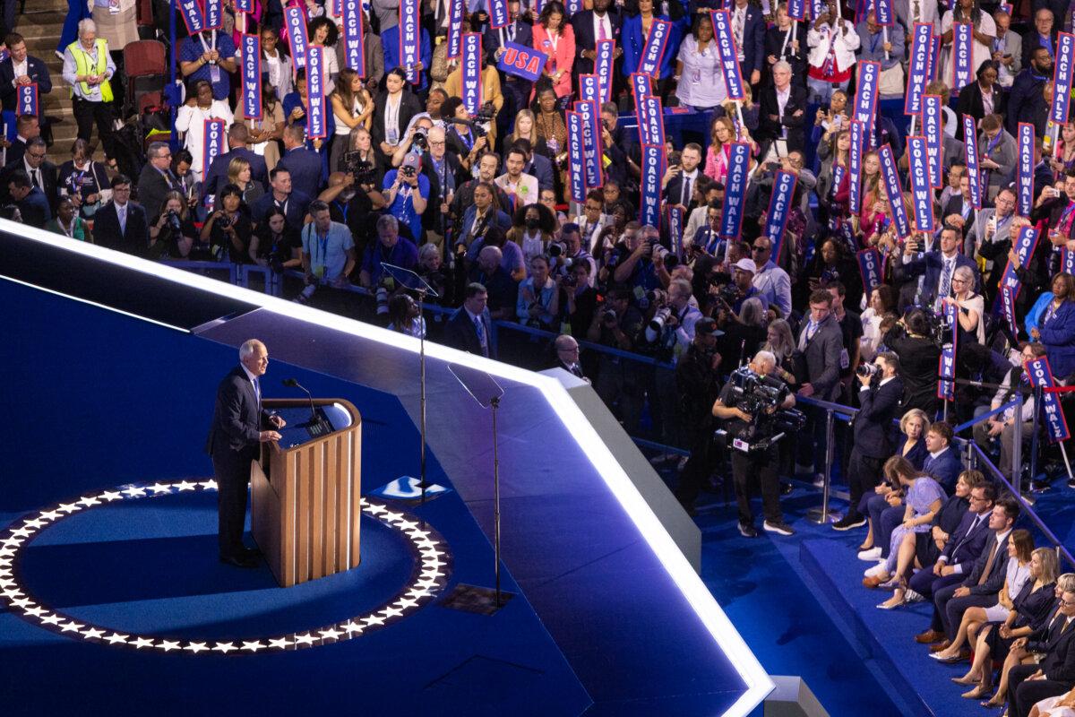 Vice Presidential nominee Tim Waltz speaks to supporters at the 2024 DNC in Chicago on Aug. 21, 2024. (John Fredricks/The Epoch Times)