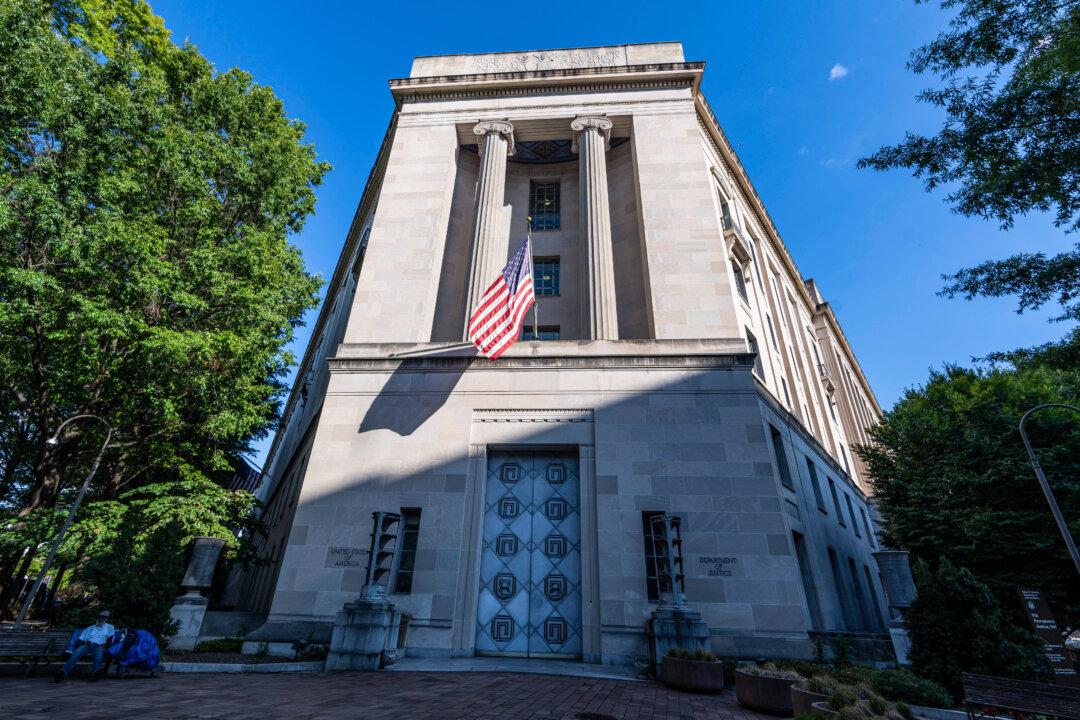 DOJ Arrests, Charges Prominent Chinese Dissident for Spying for Beijing