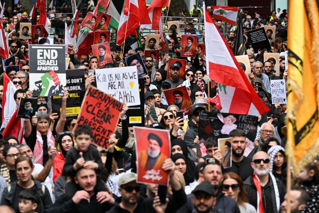 Opposition Calls for Stricter Laws on Protesters Displaying Hezbollah Flags