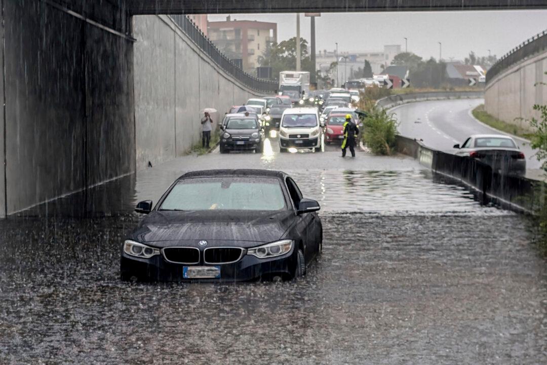 Torrential Rains in Northern Italy Flood Milan and Leave a Man Missing